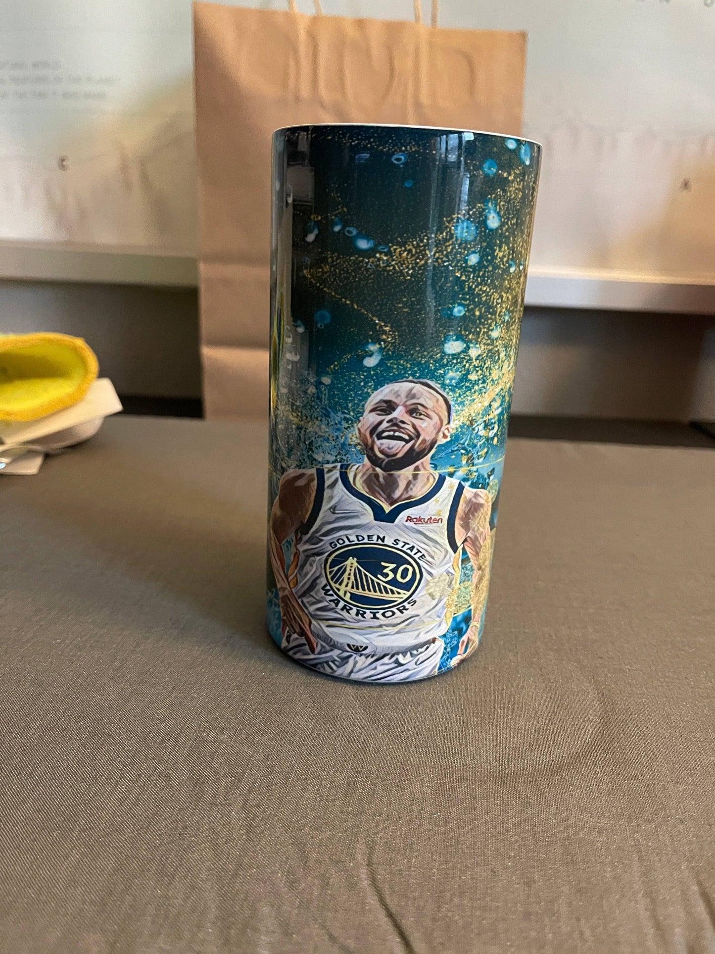 a tumbler with a picture of a basketball player on it