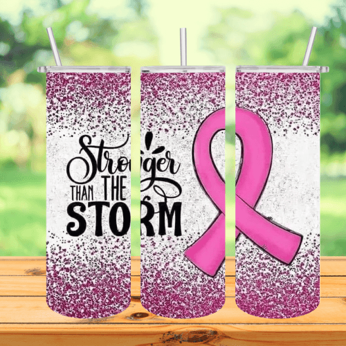 a tumbler with a pink ribbon on it that represents breast cancer