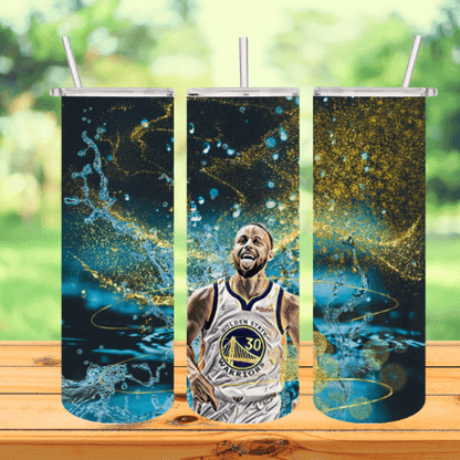 a tumbler with a picture of a basketball player on a table