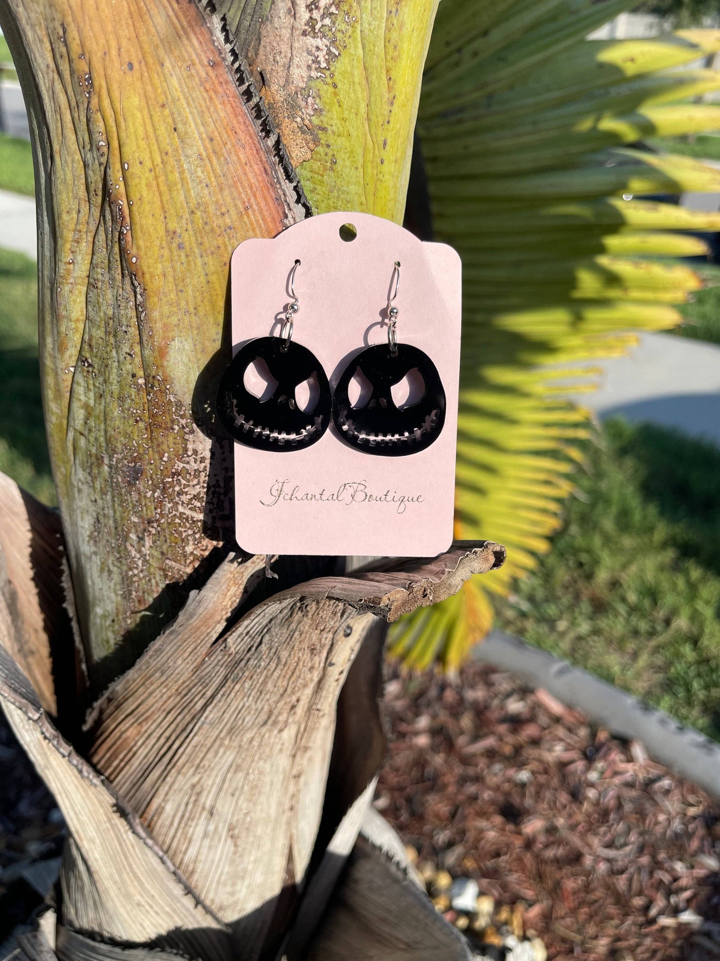 a pair of Jack Skellington earrings