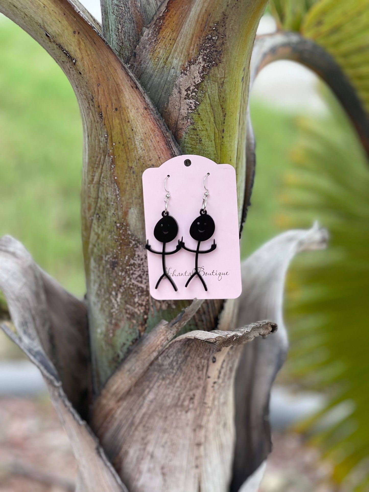 a pair of funny mad f u stick figure earrings