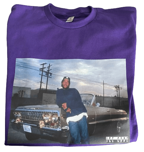 a purple shirt with a picture of Ice Cube standing next to a car