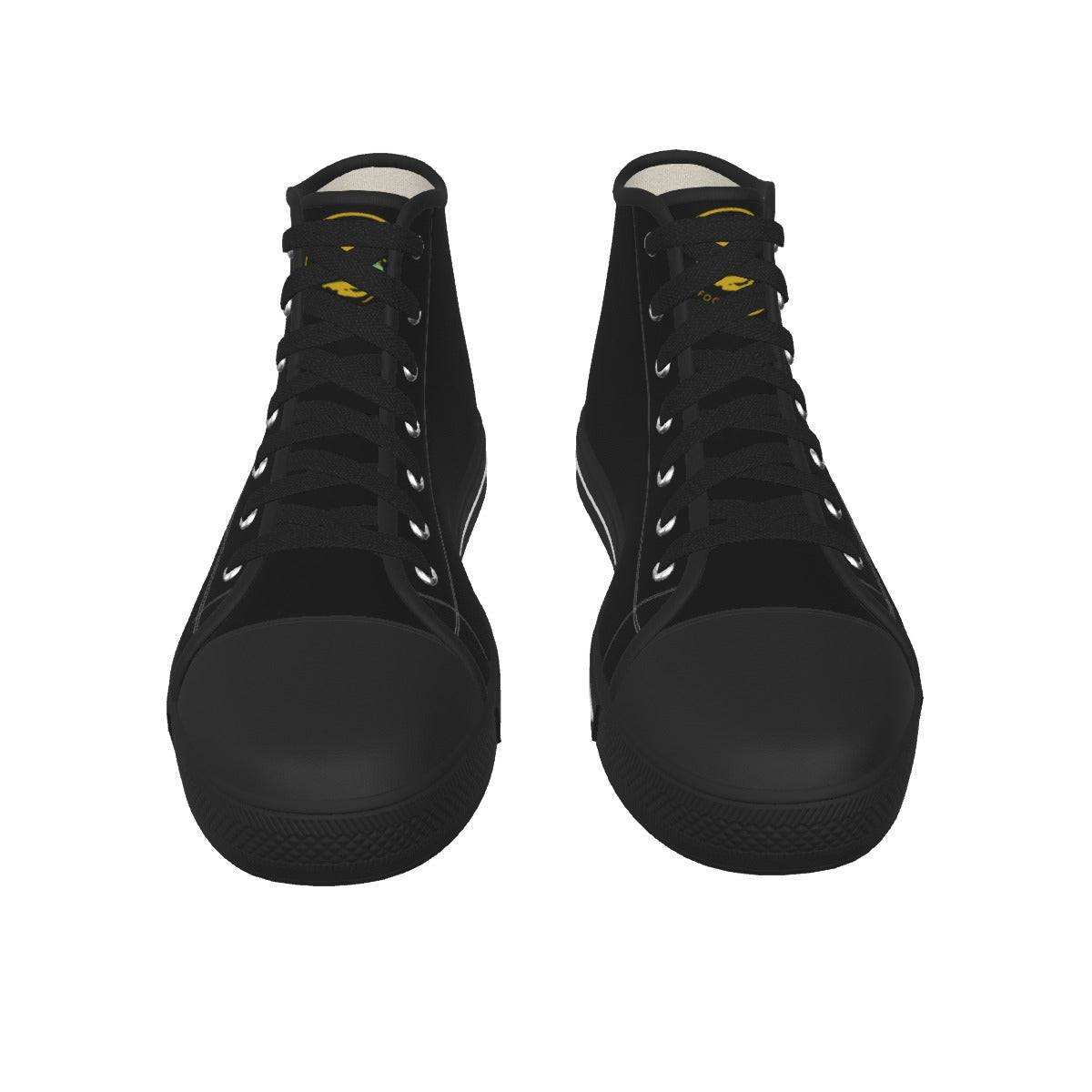 a pair of black sneakers with yellow laces