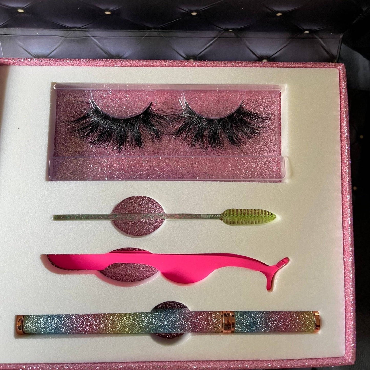 a lash box with a pair of false eyelashes