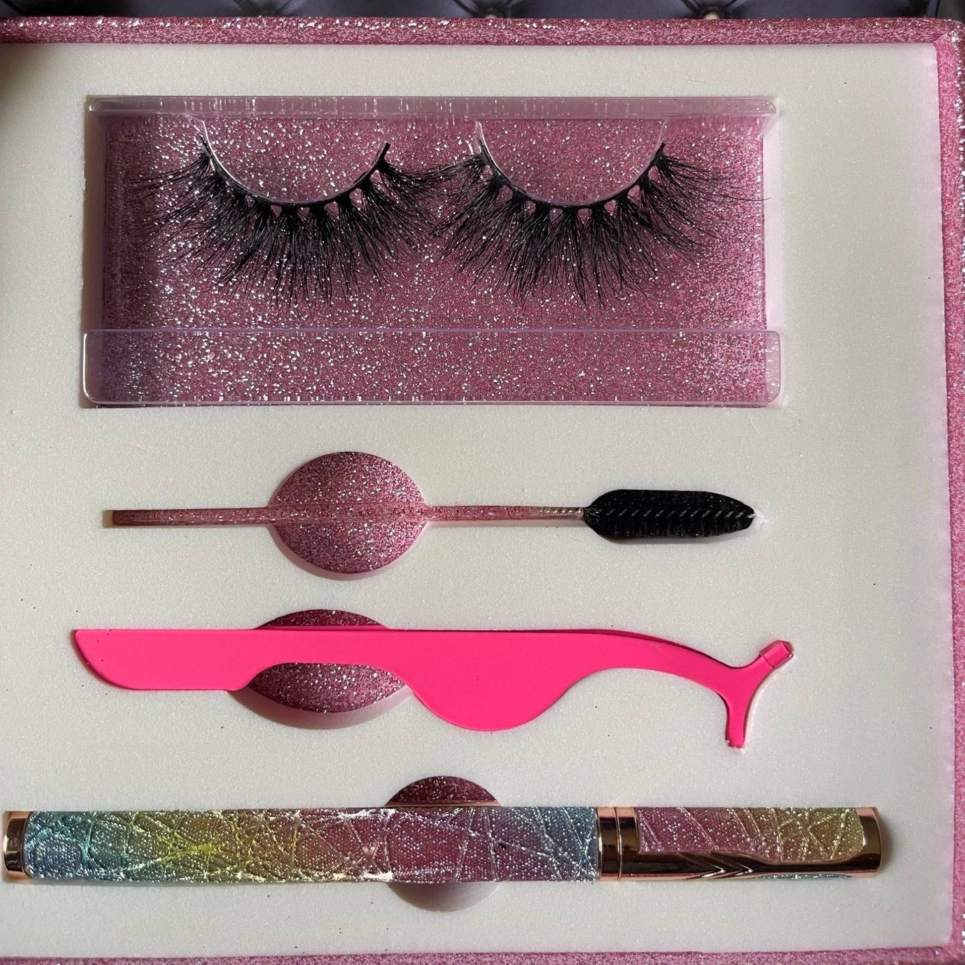 a pink box containing a pair of false eyelashes