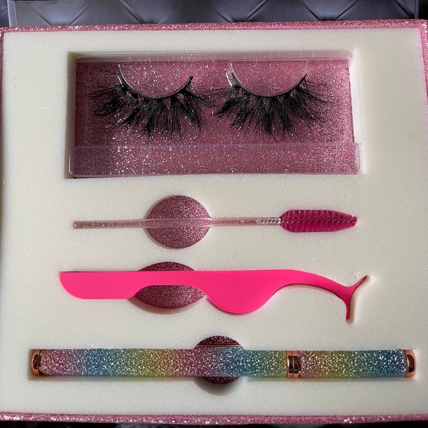 a box with a pair of false eyelashes